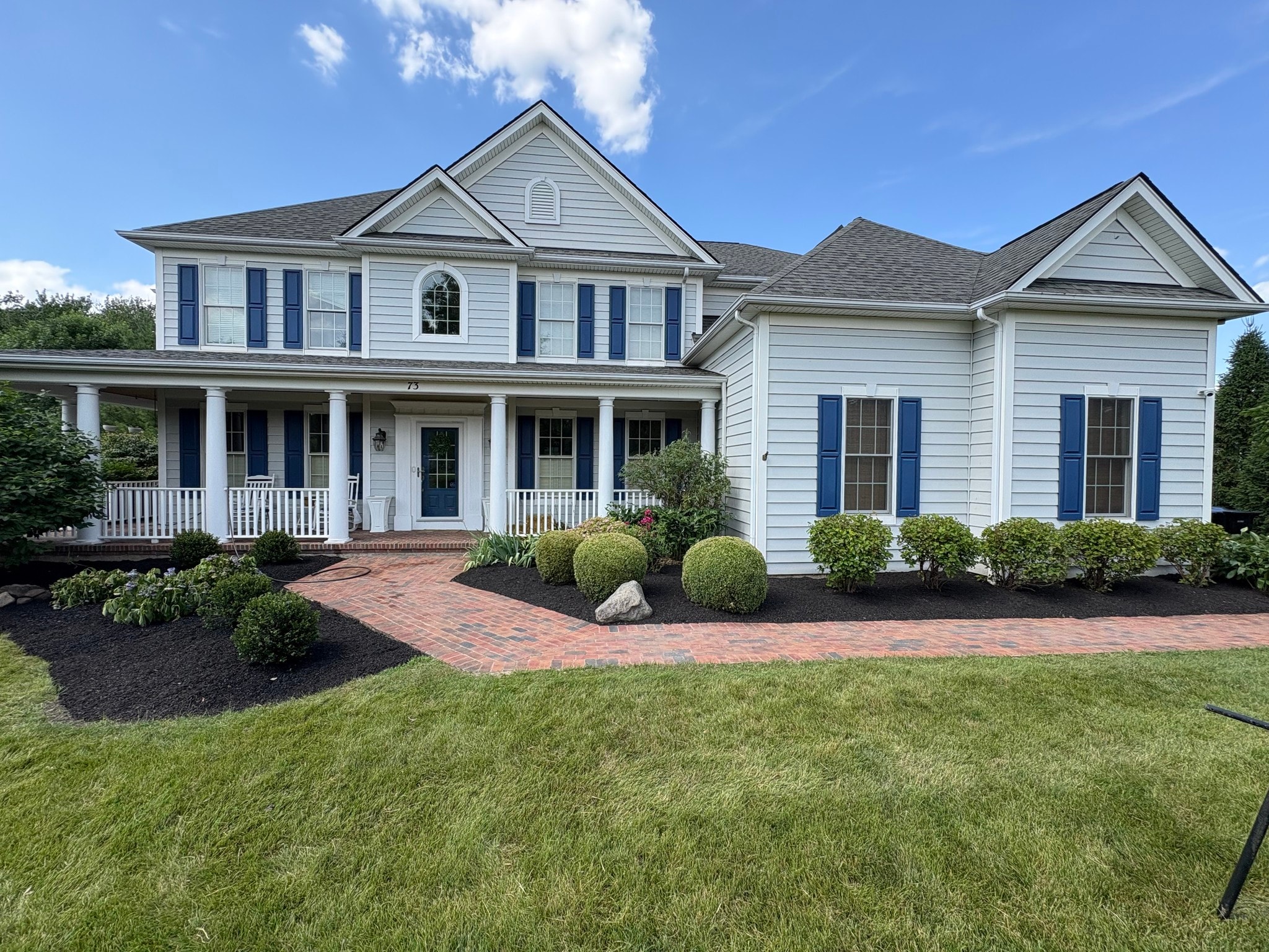 Beautiful landscaped property by Adjacent Property Management